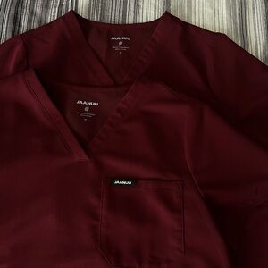 i’m selling two Jaanuu scrub tops.